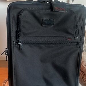 TUMI Rolling 2-Wheeled expandable carry-on